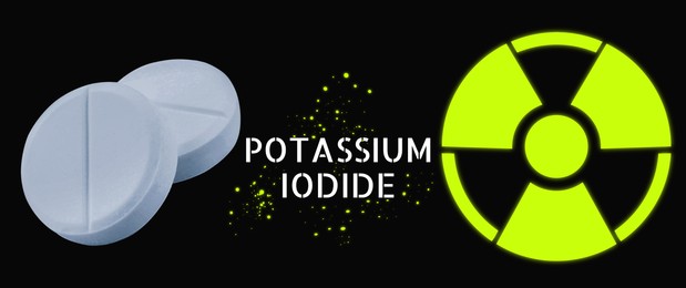 Image of Potassium iodide pills and warning sign on black background. Iodine consumption during radioactive contamination