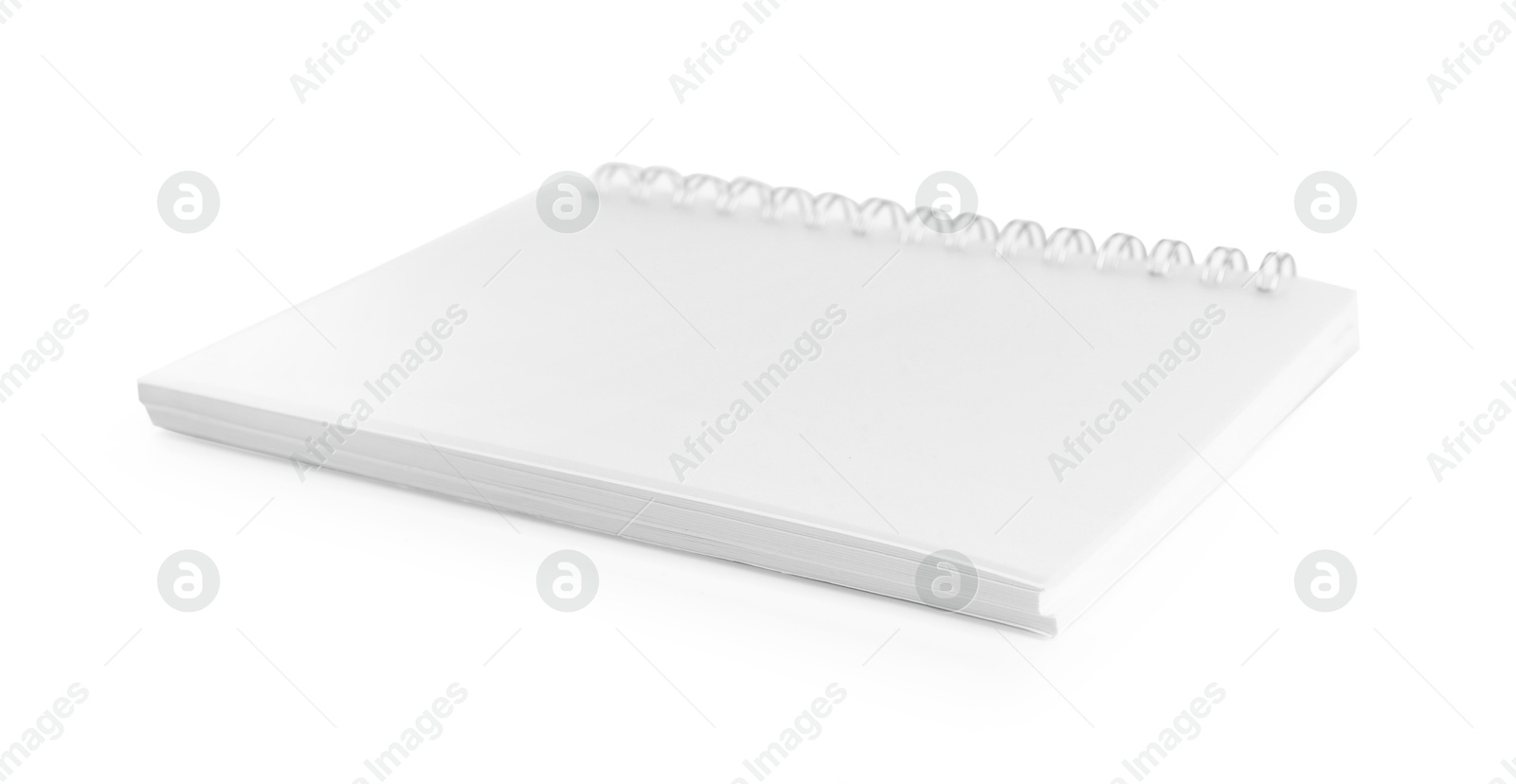 One notebook with spiral isolated on white Photo of One notebook with spiral isolated on white