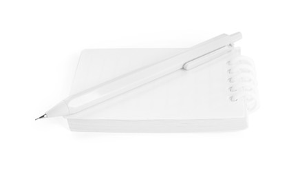 Photo of Notebook and mechanical pencil isolated on white
