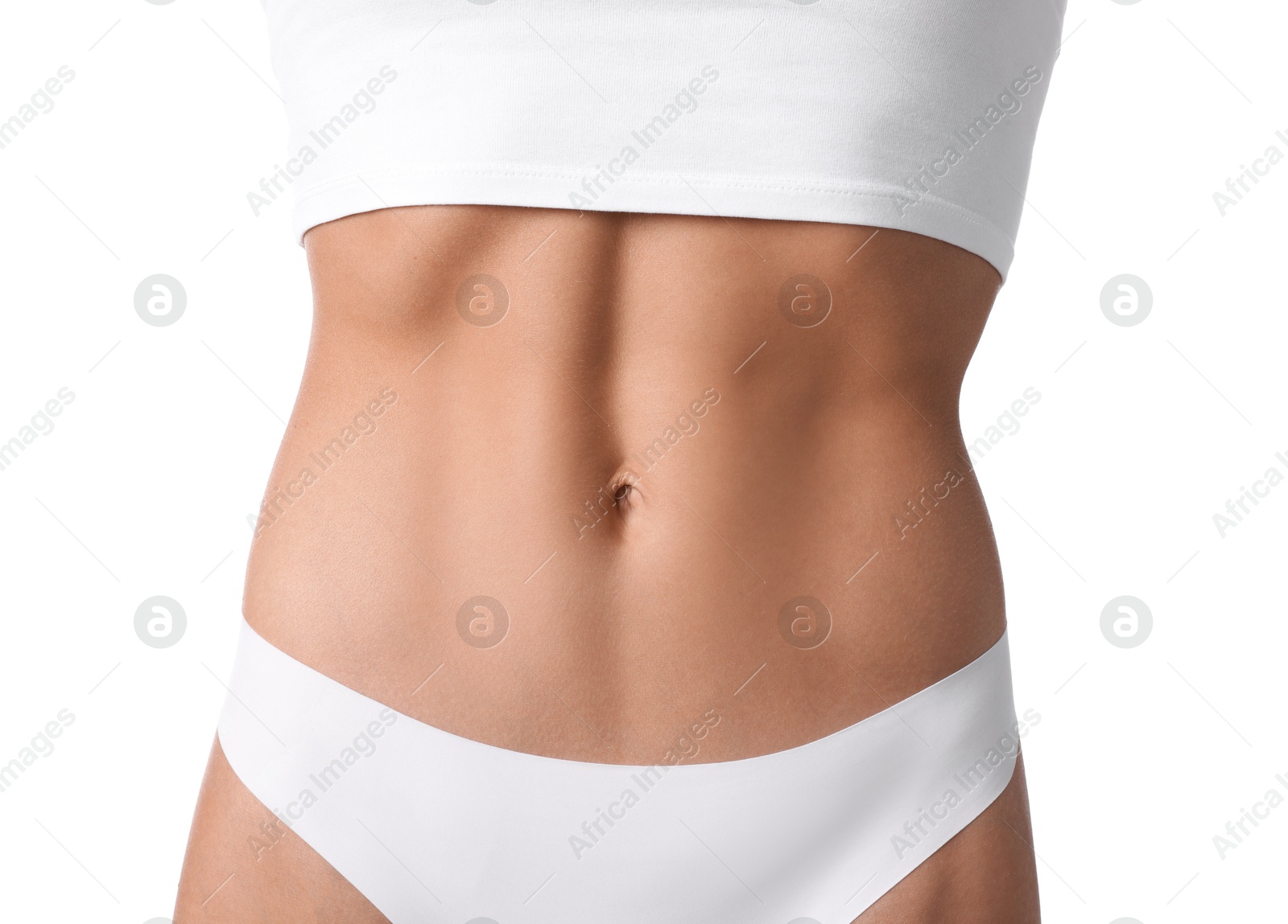 Woman with flat belly on white background, closeup Photo of Woman with flat belly on white background, closeup