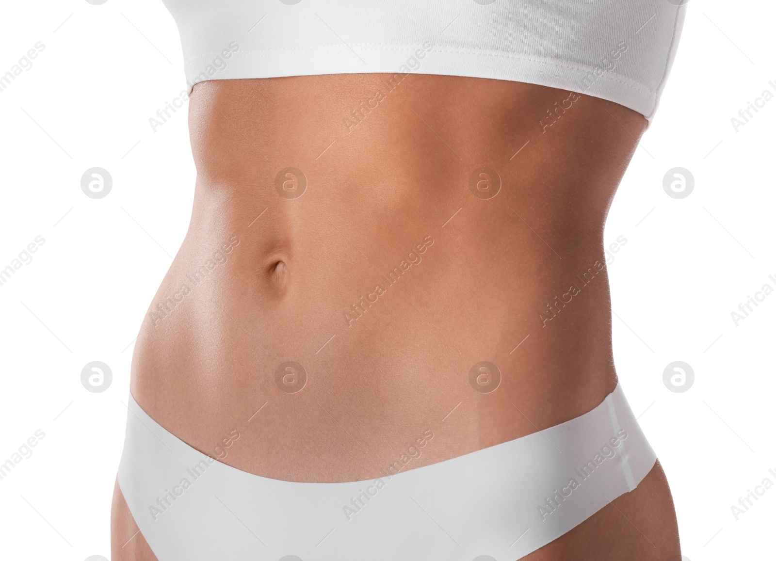 Woman with flat belly on white background, closeup Photo of Woman with flat belly on white background, closeup