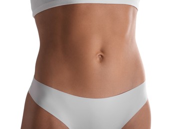 Photo of Woman with flat belly on white background, closeup