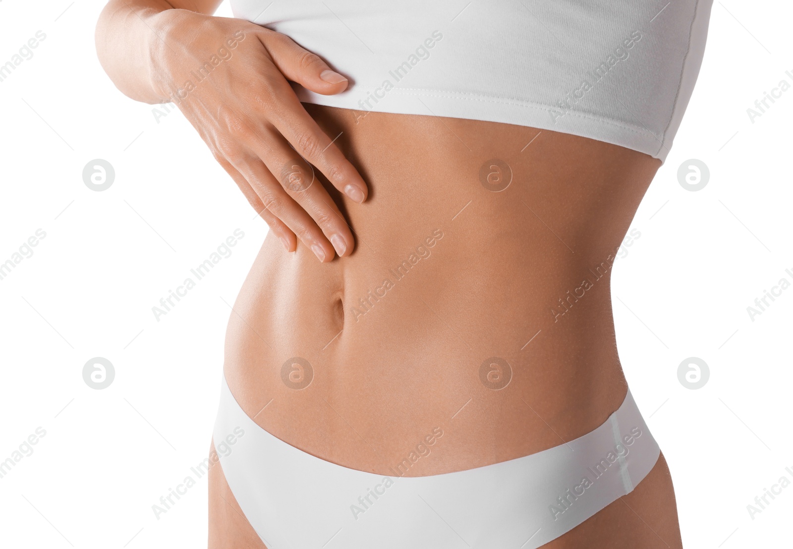 Woman with flat belly on white background, closeup Photo of Woman with flat belly on white background, closeup