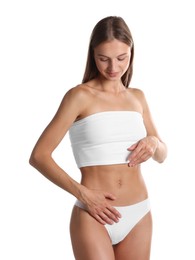 Photo of Woman with flat belly on white background