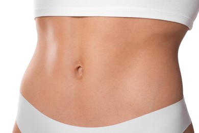 Photo of Woman with flat belly on white background, closeup