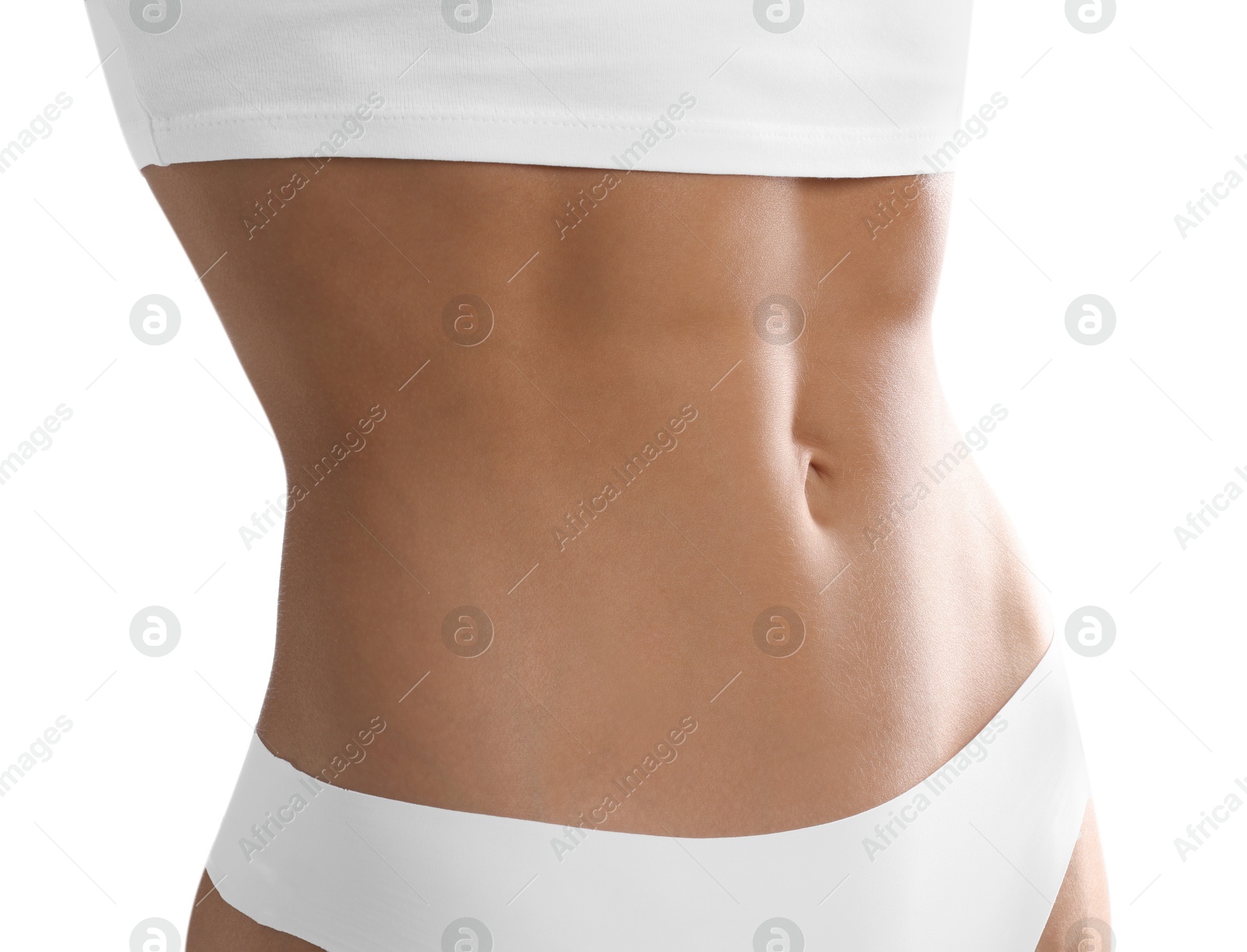 Woman with flat belly on white background, closeup Photo of Woman with flat belly on white background, closeup