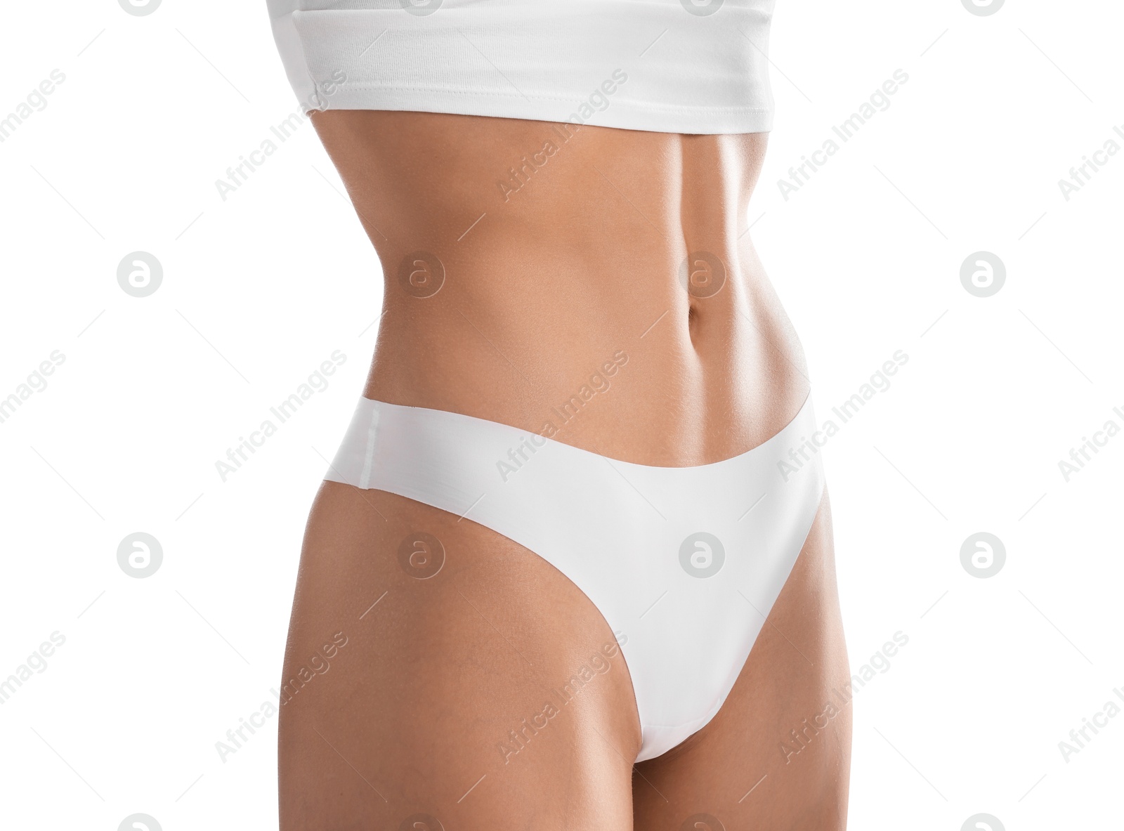 Woman with flat belly on white background, closeup Photo of Woman with flat belly on white background, closeup