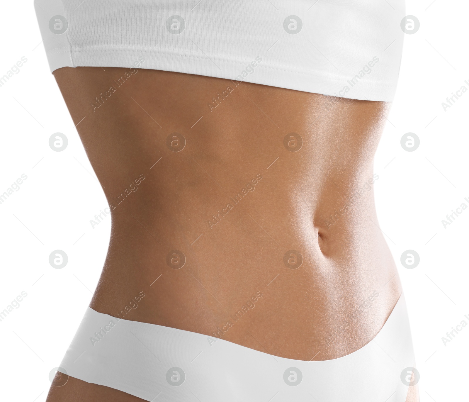 Woman with flat belly on white background, closeup Photo of Woman with flat belly on white background, closeup