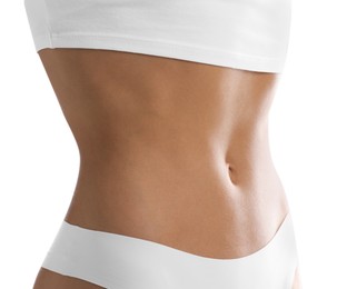 Photo of Woman with flat belly on white background, closeup