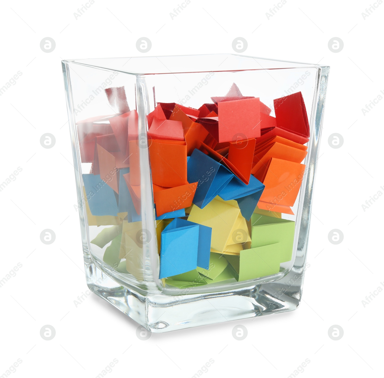 Colorful paper pieces in glass jar isolated on white Photo of Colorful paper pieces in glass jar isolated on white