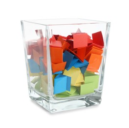 Photo of Colorful paper pieces in glass jar isolated on white