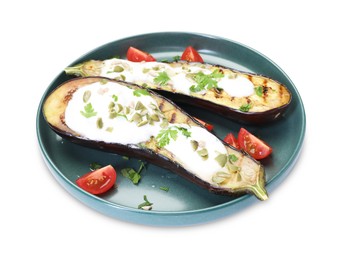 Photo of Slices of grilled eggplant with pumpkin seeds and yoghurt isolated on white