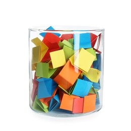Photo of Many colorful paper pieces in glass isolated on white