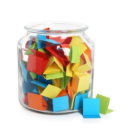 Photo of Many colorful paper pieces in glass jar isolated on white