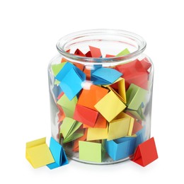 Photo of Many colorful paper pieces in glass jar isolated on white