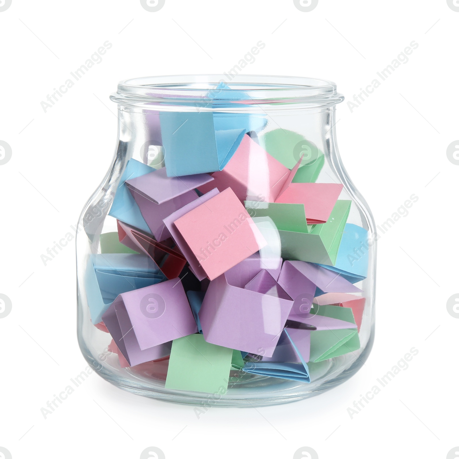 Many colorful paper pieces in glass jar isolated on white Photo of Many colorful paper pieces in glass jar isolated on white