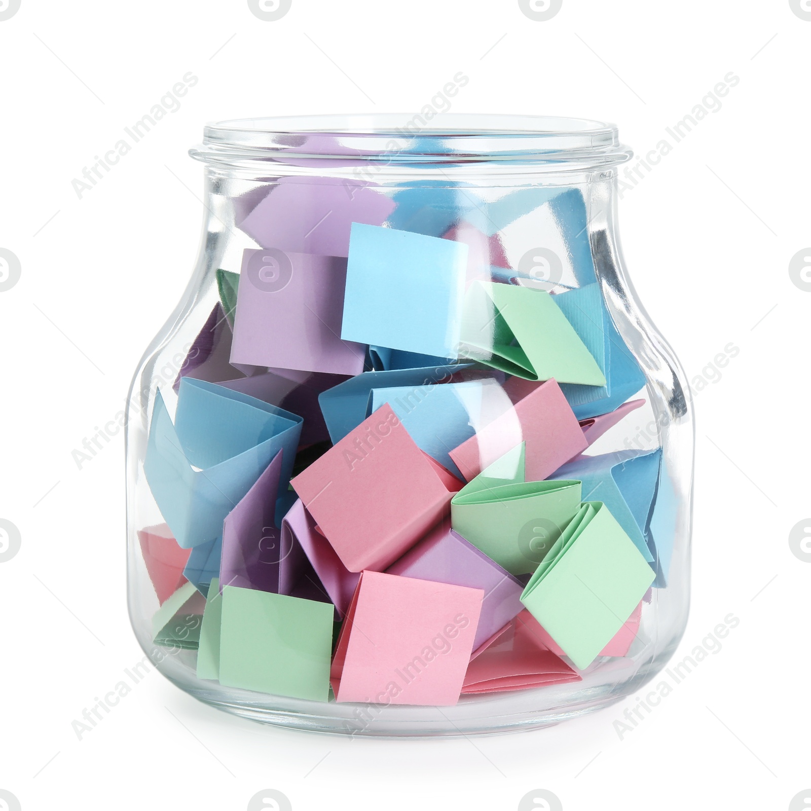 Many colorful paper pieces in glass jar isolated on white Photo of Many colorful paper pieces in glass jar isolated on white
