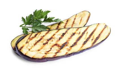 Photo of Slices of grilled eggplant and parsley isolated on white