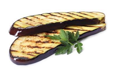 Photo of Slices of grilled eggplant and parsley isolated on white