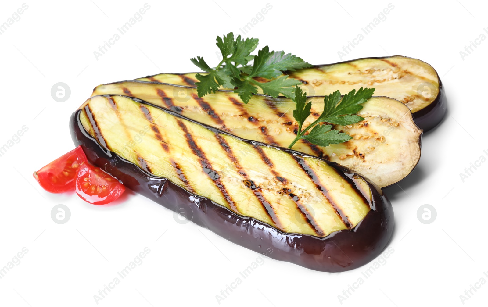 Slices of grilled eggplant, parsley and tomatoes isolated on white Photo of Slices of grilled eggplant, parsley and tomatoes isolated on white