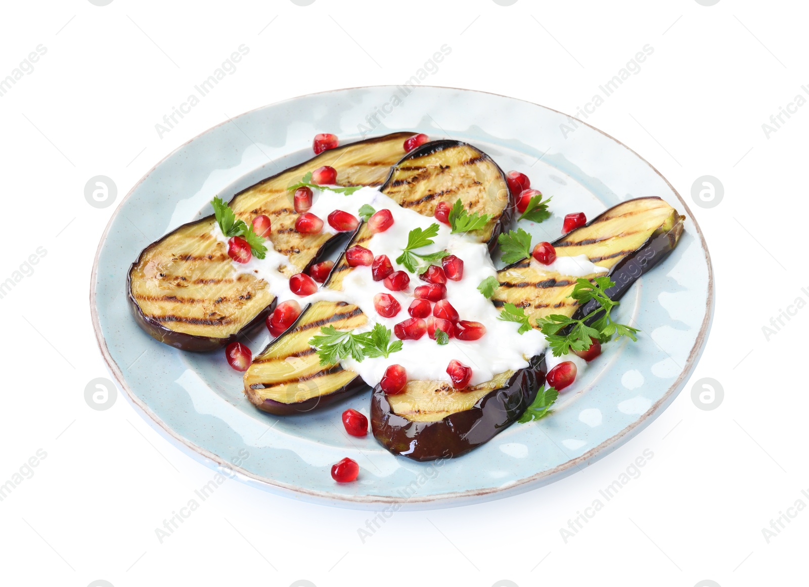 Slices of grilled eggplant, yoghurt, parsley and pomegranate seeds isolated on white Photo of Slices of grilled eggplant, yoghurt, parsley and pomegranate seeds isolated on white