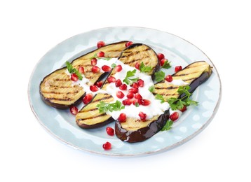 Photo of Slices of grilled eggplant, yoghurt, parsley and pomegranate seeds isolated on white