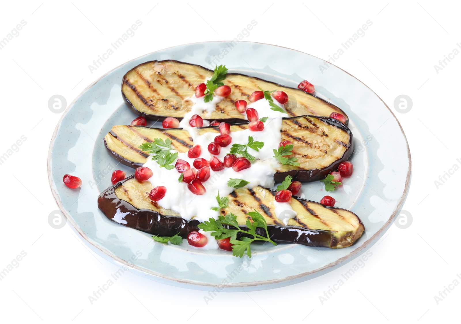 Slices of grilled eggplant, yoghurt, parsley and pomegranate seeds isolated on white Photo of Slices of grilled eggplant, yoghurt, parsley and pomegranate seeds isolated on white