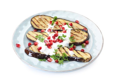 Photo of Slices of grilled eggplant, yoghurt, parsley and pomegranate seeds isolated on white