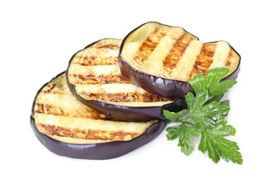 Photo of Slices of grilled eggplant and parsley isolated on white