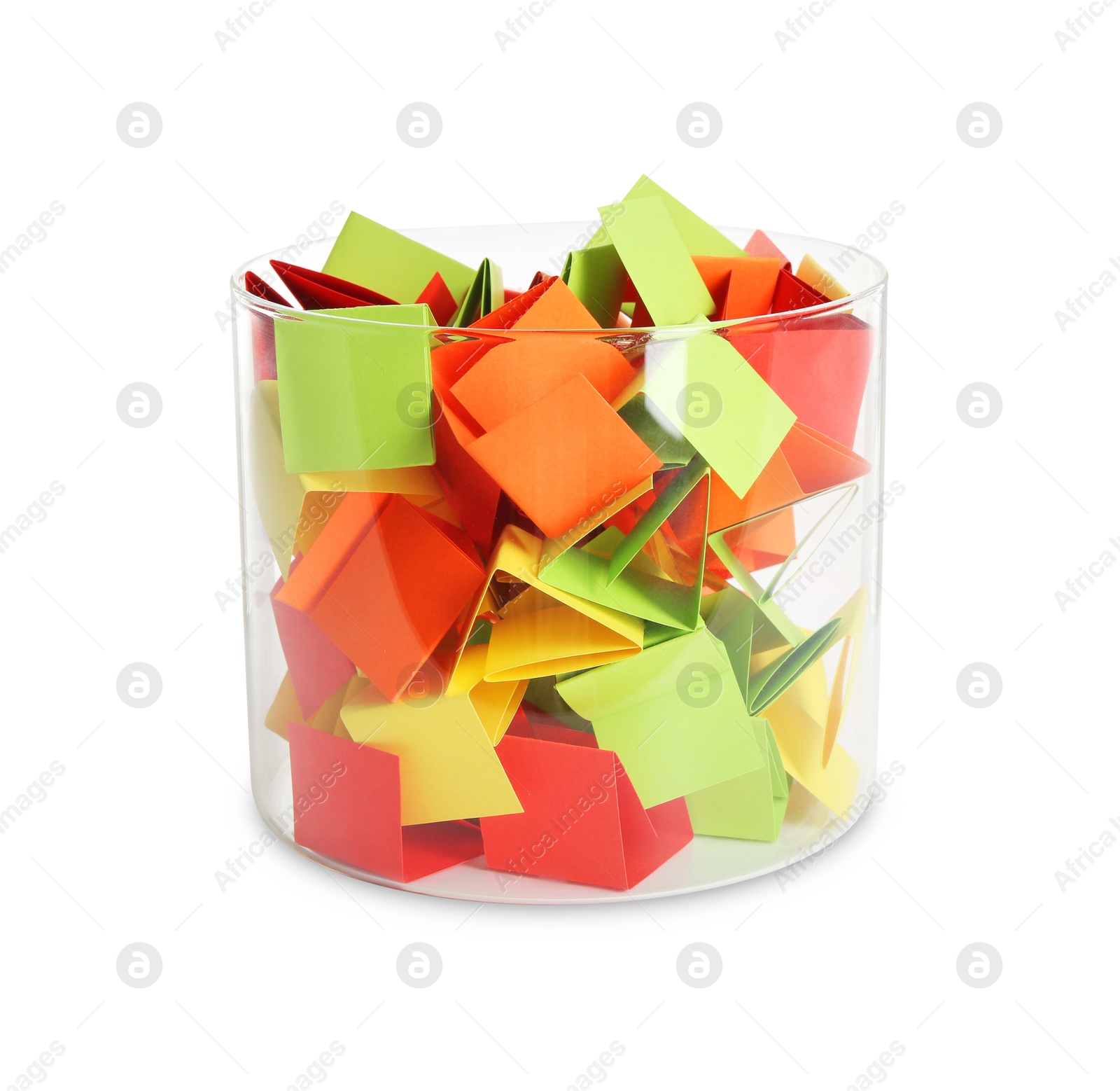 Many colorful paper pieces in glass isolated on white Photo of Many colorful paper pieces in glass isolated on white