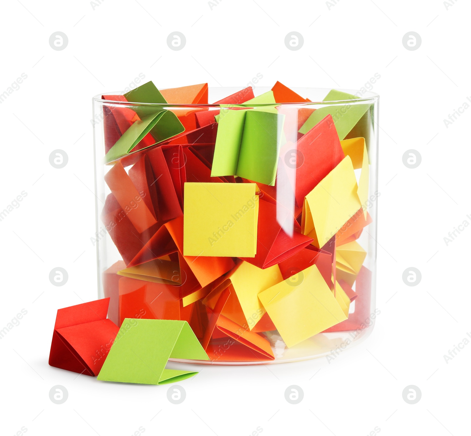Many colorful paper pieces in glass isolated on white Photo of Many colorful paper pieces in glass isolated on white