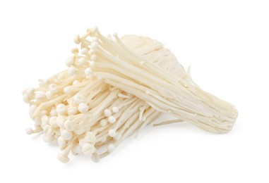 Photo of Clusters of fresh enoki mushrooms isolated on white