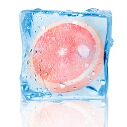 Image of Half of fresh grapefruit inside ice cube on white background