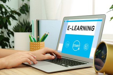 Image of E-learning concept. Woman studying online using laptop at desk, closeup