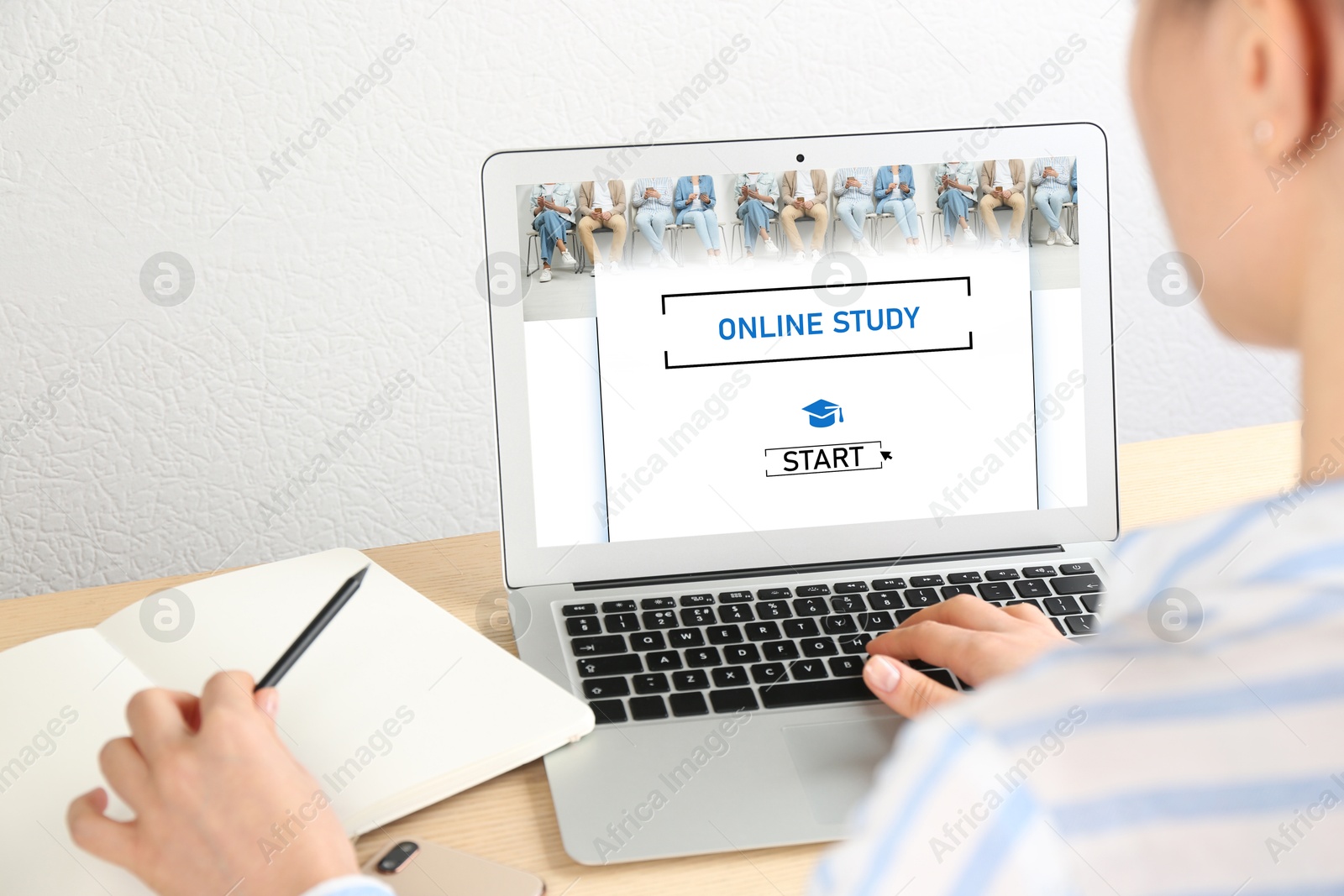 Online study. Woman using laptop for e-learning at desk, closeup Image of Online study. Woman using laptop for e-learning at desk, closeup