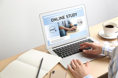 Image of Online study. Woman using laptop for e-learning at desk, closeup