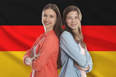 Image of Students against flag of Germany. Language school