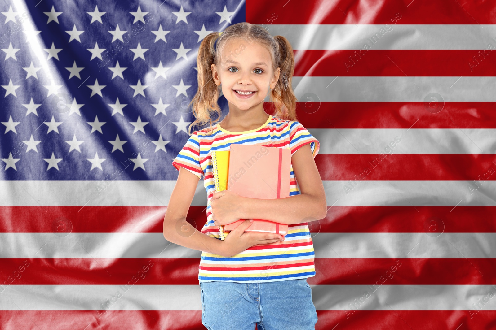Little girl with notebooks against flag of USA. Language school Image of Little girl with notebooks against flag of USA. Language school