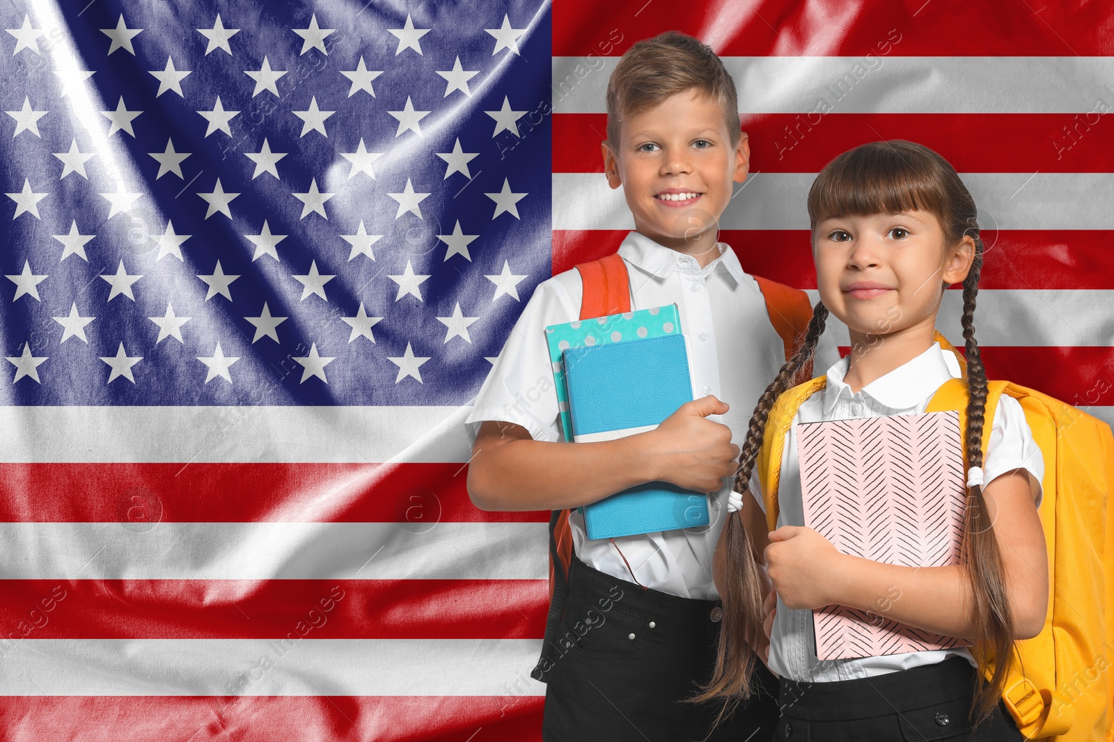 Children with backpacks and notebooks against flag of USA. Language school Image of Children with backpacks and notebooks against flag of USA. Language school