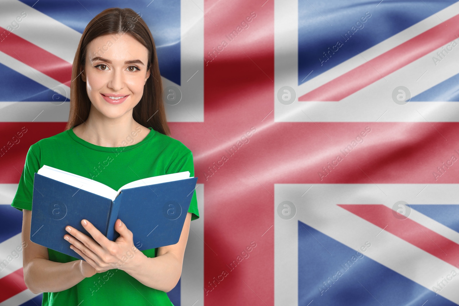 Teacher or student with book against flag of United Kingdom. Language school Image of Teacher or student with book against flag of United Kingdom. Language school