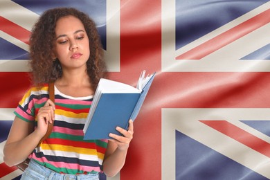 Image of Student with book against flag of United KIngdom. Language school