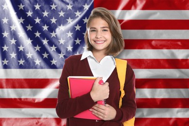 Image of Student with backpack and notebooks against flag of USA. Language school
