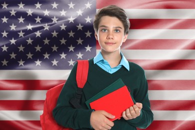 Image of Student with backpack and notebooks against flag of USA. Language school