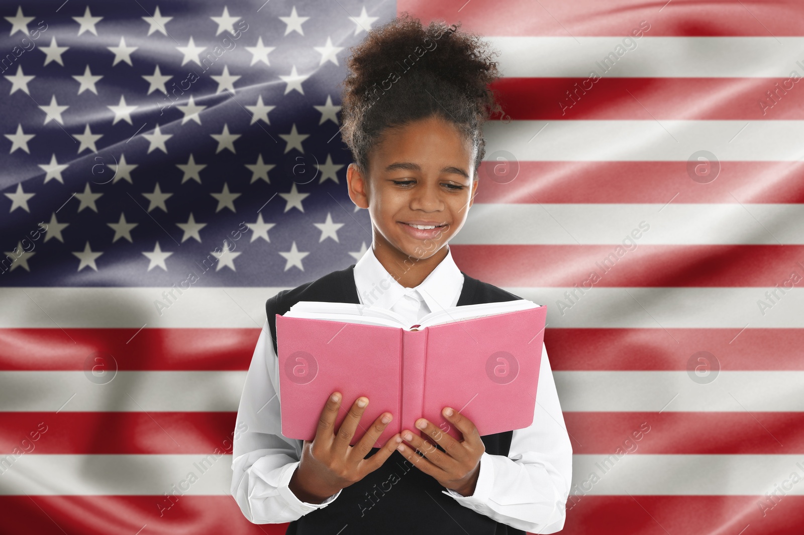 Little girl with book against flag of USA. Language school Image of Little girl with book against flag of USA. Language school