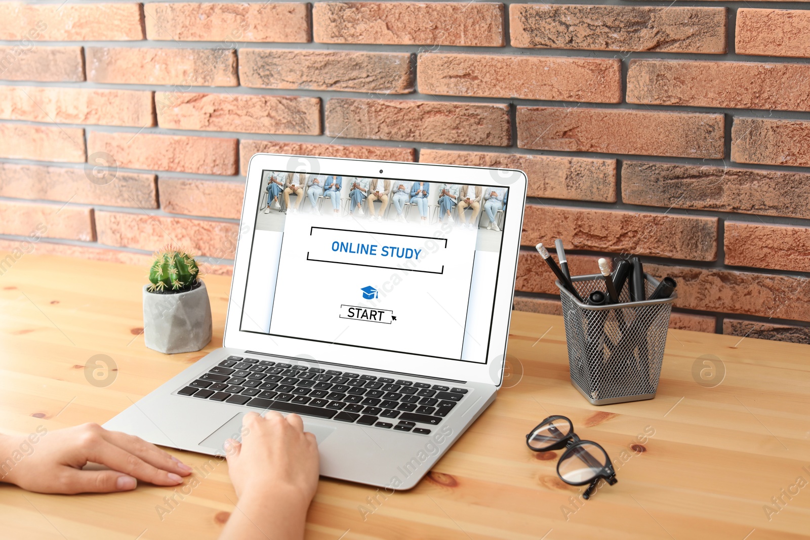 Image of Online study. Woman using laptop for e-learning at desk, closeup