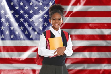 Image of Little girl with backpack and notebooks against flag of USA. Language school