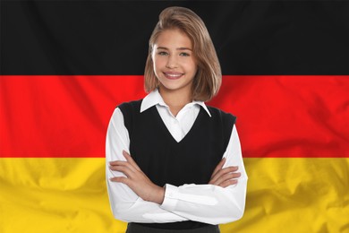Image of Student against flag of Germany. Language school