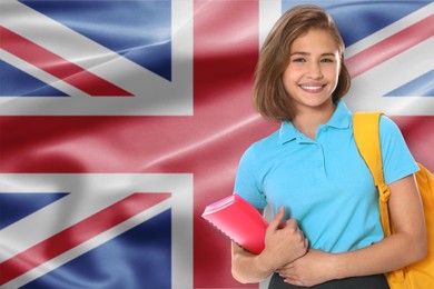 Image of Student with backpack and notebook against flag of United Kingdom. Language school