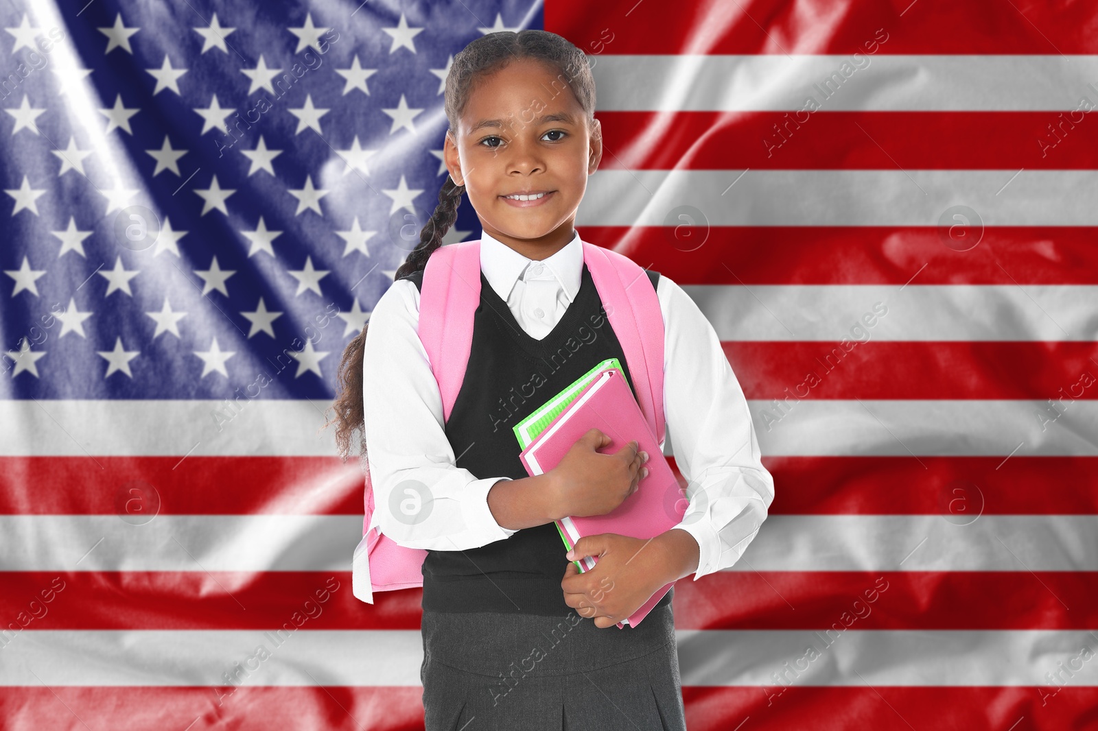 Little girl with backpack and notebooks against flag of USA. Language school Image of Little girl with backpack and notebooks against flag of USA. Language school
