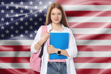 Image of Student with notebooks and backpack against flag of USA. Language school